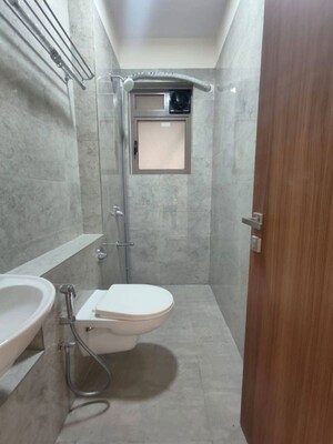 Bathroom in 2 BHK Apartment at Raj Infinia, Malad West – for Rent