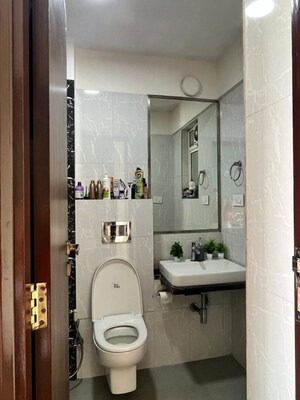 Bathroom in 2 BHK Apartment at Omkar Alta Monte, Malad East – for Rent