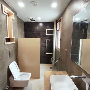 Bathroom in 5 BHK Builder Floor at Model Town Phase 1 – for Rent
