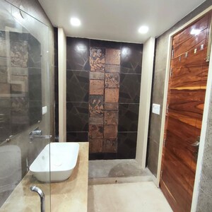 Bathroom in 5 BHK Builder Floor at Model Town Phase 1 – for Rent