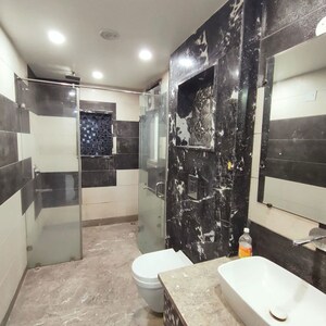 Bathroom in 5 BHK Builder Floor at Model Town Phase 1 – for Rent