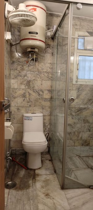 Bathroom in 4 BHK Apartment at Vasant Kunj – for Rent