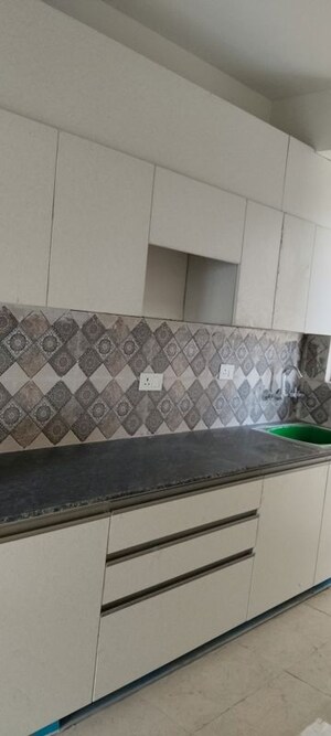 Kitchen in 2 BHK Apartment at Unitech Uniworld Gardens 2, Sector 47 – for Rent