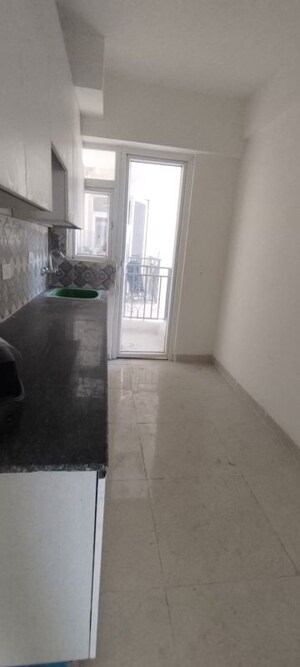 Kitchen in 2 BHK Apartment at Unitech Uniworld Gardens 2, Sector 47 – for Rent