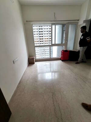 Living Room in 1 BHK Apartment at Omkar Signet, Malad East – for Rent