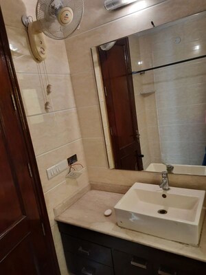 Bathroom in 3 BHK Builder Floor at Gulmohar Park – for Sale