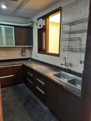 Kitchen in 3 BHK Builder Floor at Gulmohar Park – for Sale