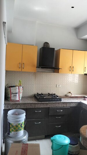 Kitchen in 2.5 BHK Apartment at SRS Royal Hills, Sector 87 – for Rent
