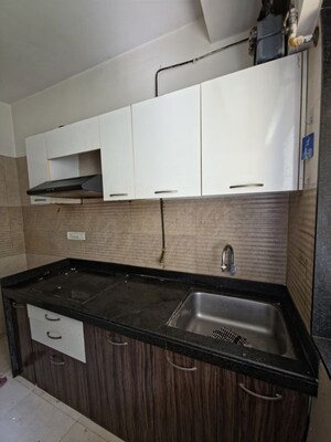 Kitchen in 2 BHK Apartment at Sethia Green View, Goregaon West – for Rent