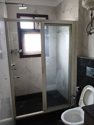 Bathroom in 3 BHK Builder Floor at Pamposh Enclave – for Rent
