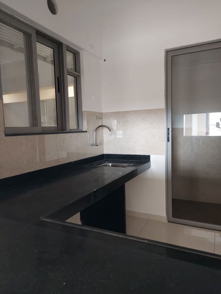 Kitchen, vilas-javdekar-yashwin-enchante 3 Bedroom 900 Sq.Ft. Apartment In Kharadi Pune 10469313