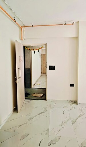 Bathroom in 2 BHK Apartment at Ruparel Sky Green, Kandivali West – for Rent