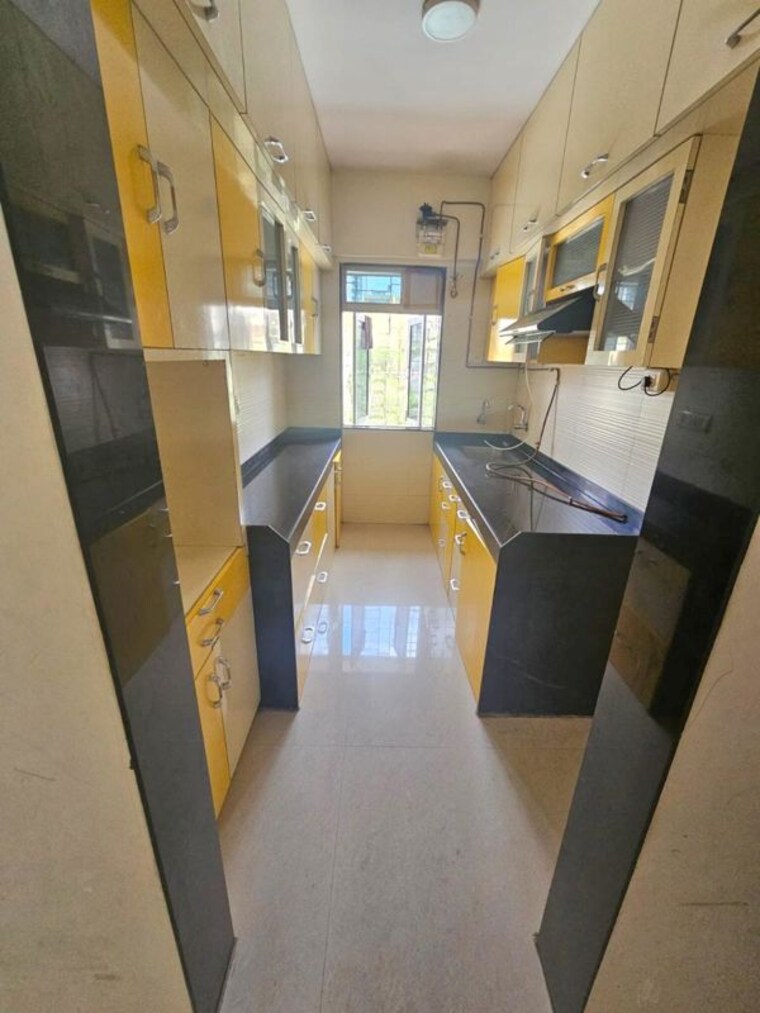 Kitchen, cosmos-classique 2 Bedroom 670 Sq.Ft. Apartment In Ghodbunder Road Thane 10473891