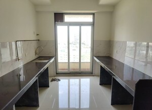 Kitchen in 4 BHK Apartment at Evershine Nagar – for Sale