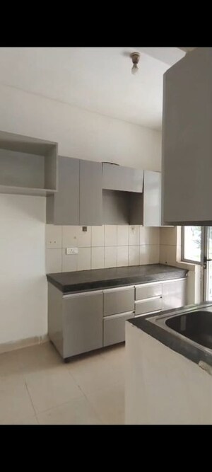 Kitchen in 2 BHK Apartment at Vatika City Homes, Sector 83 – for Sale