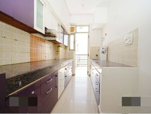 Kitchen in 2 BHK Apartment at Ajnara Gen X, Dundahera – for Sale