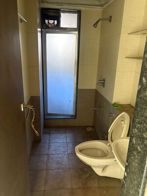 Bathroom in 2 BHK Apartment at Bhakti Heights Tilak Nagar, Tilak Nagar – for Rent