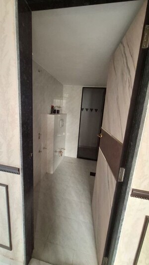 Bathroom in 1 BHK Apartment at Happy Home Sarvoday Marvel, Kalyan West – for Sale