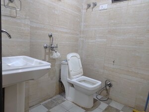 Bathroom in 3 BHK Builder Floor at Maidan Garhi – for Rent