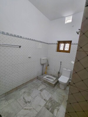 Bathroom in 1 BHK Builder Floor at Ballupur – for Rent