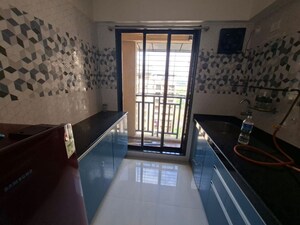 Kitchen in 1 BHK Apartment at Raunak 108, Kasarvadavali – for Rent