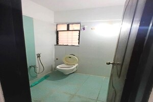 Bathroom in 1 BHK Apartment at shiv Kalp Homes, Wadgaon Sheri – for Rent