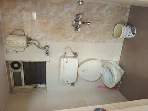 Bathroom in 1 BHK Apartment at Unique Aurum, Mira Road – for Rent