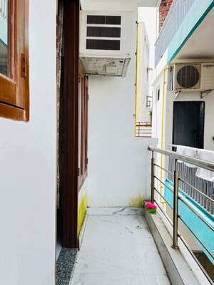 Building Lobby in 1 BHK Apartment at Sainik Farm – for Rent