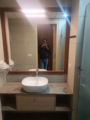 Bathroom in Studio Apartment at Gaur Runway Suites, Gaur Yamuna City – for Rent