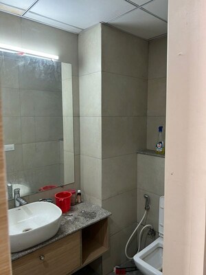 Bathroom in 1 RK Apartment at Gaur The Hub, Gaur Yamuna City – for Rent