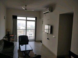 Living Room in 1 BHK Apartment at Jaypee Greens Pavilion Court, Sector 128 – for Rent