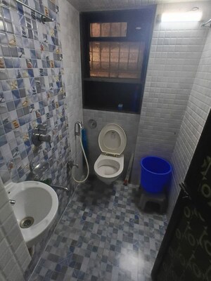 Bathroom in 2 BHK Apartment at Green Meadows Bluilding 2 Chs Ltd, Kandivali East – for Rent