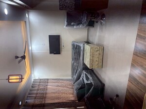 Living Room in 1 BHK Apartment at Supertech Czar Suites, Omicron I Greater Noida – for Rent