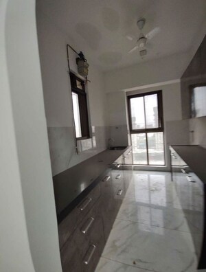 Kitchen in 2 BHK Apartment at Colorplus Raymond Realty Phase I, Pokhran Road No Two – for Rent