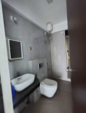 Bathroom in 2 BHK Apartment at Colorplus Raymond Realty Phase I, Pokhran Road No Two – for Rent