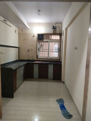 Kitchen in 2 BHK Apartment at Pride Presidency Luxuria, Ghodbunder Road – for Sale