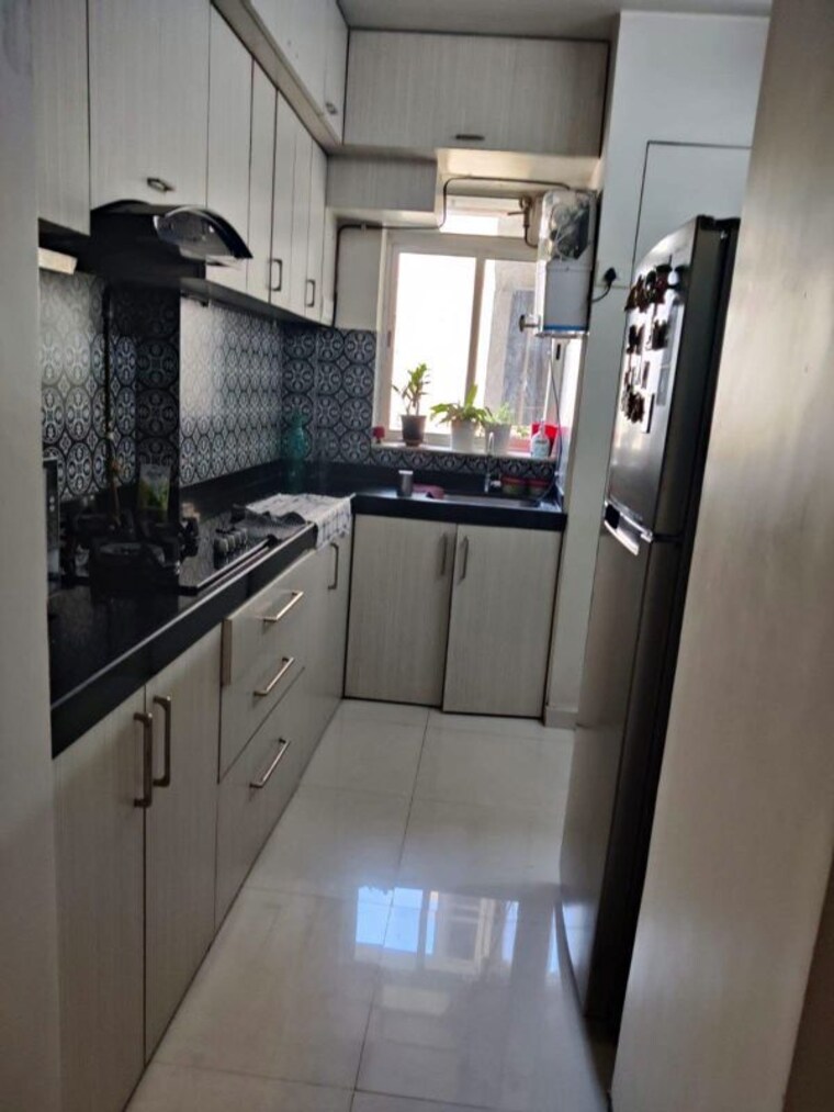 Kitchen, lodha-amara 2 Bedroom 950 Sq.Ft. Apartment In Kolshet Road Thane 10475338