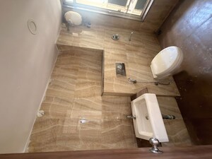 Bathroom in 2 BHK Apartment at Lodha Amara, Kolshet Road – for Rent