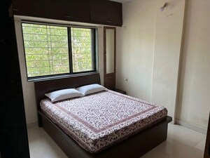 Bedroom in 2 BHK Apartment at Wadgaon Sheri – for Rent
