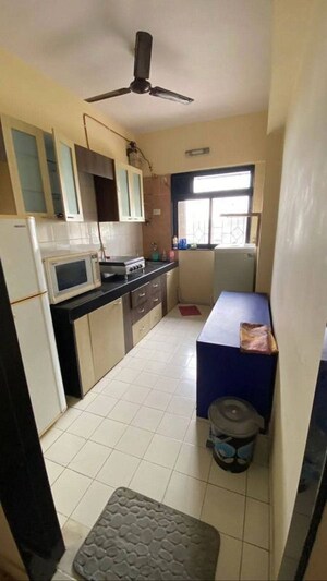 Kitchen in 2 BHK Apartment at Mantri Park, Goregaon East – for Rent