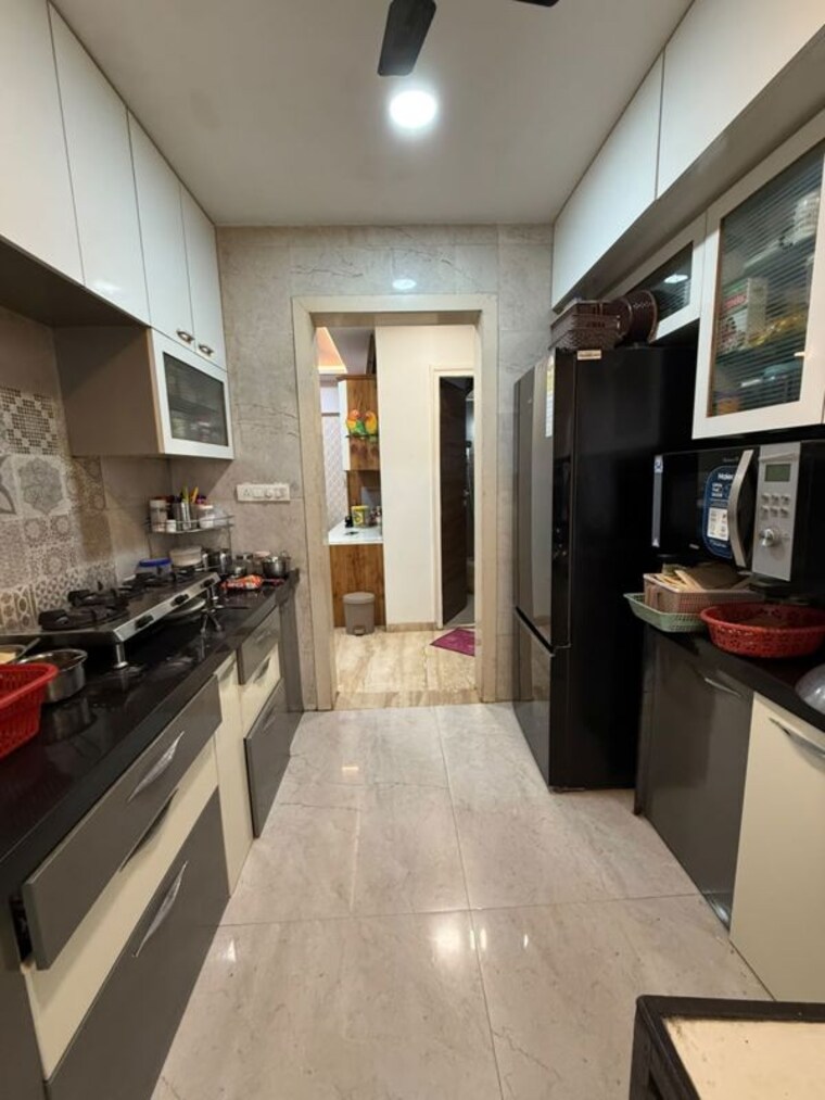 Kitchen, auralis-the-twins 2 Bedroom 872 Sq.Ft. Apartment In Louis Wadi Thane 10475500
