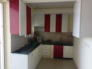 Kitchen in 2 BHK Apartment at Jaypee Greens Aman, Sector 151 – for Sale