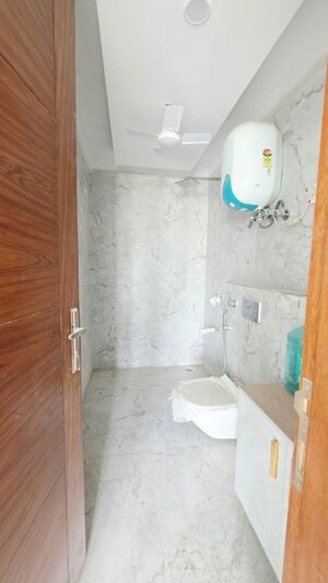 Bathroom in 4 BHK Builder Floor at Freedom Fighters Enclave – for Sale