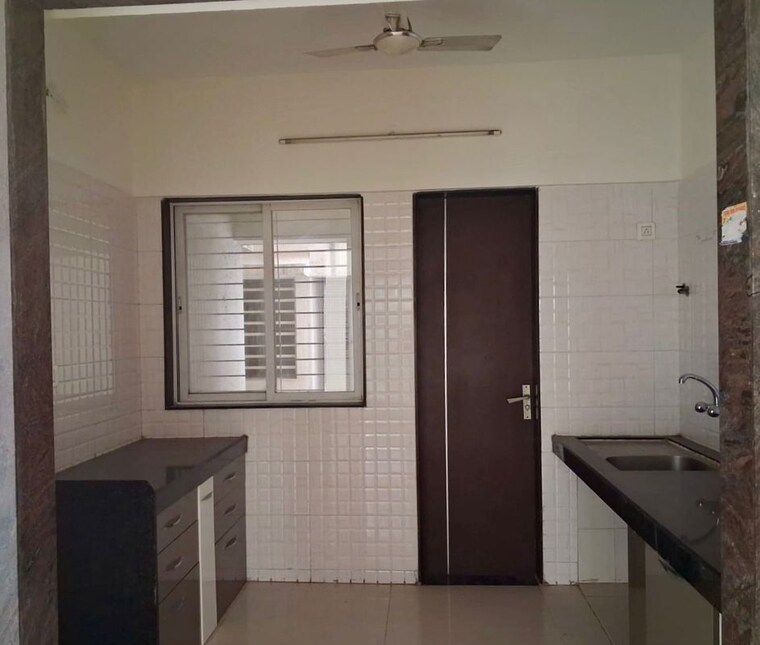 Kitchen, regency-classic 3 Bedroom 1350 Sq.Ft. Apartment In Baner Pune 10475754