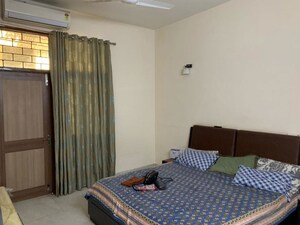 Bedroom in 2 BHK Builder Floor at Jawahar Nagar – for Rent