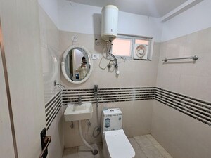 Bathroom in 2 BHK Apartment at Shree Vardhman Green Court, Sector 90 – for Rent