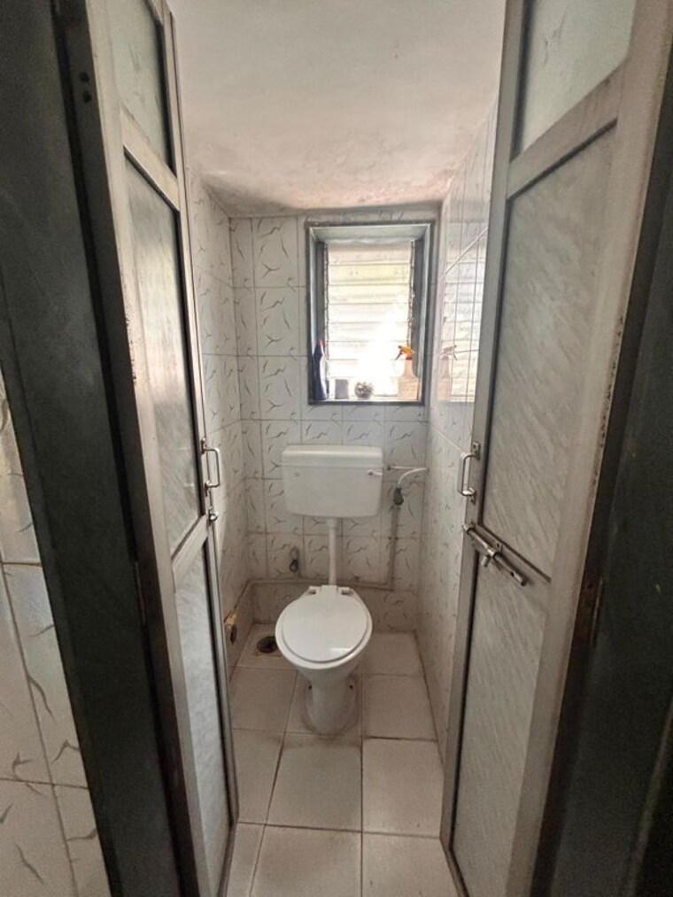 Bathroom, baba-ekta 2 Bedroom 600 Sq.Ft. Apartment In Kurla East Mumbai 10476195