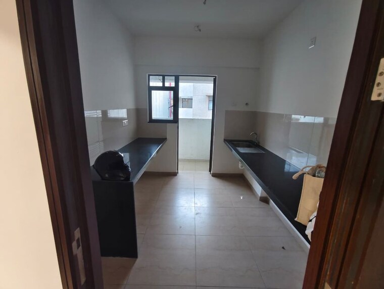 Kitchen, kalpataru-magnus 2 Bedroom 850 Sq.Ft. Apartment In Bandra East Mumbai 10476262