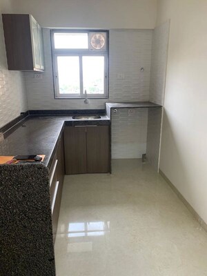 Kitchen in 2 BHK Apartment at Chandiwala Pearl Regency, Andheri West – for Rent
