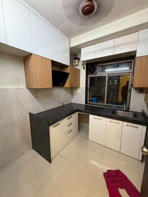 Kitchen in 2 BHK Apartment at Runwal Eirene, Balkum Pada – for Rent